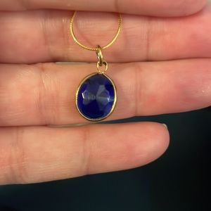 Blue pendant on gold plated chain